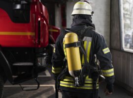 firefighter-at-the-station-with-suit-and-safety-helmet (1)